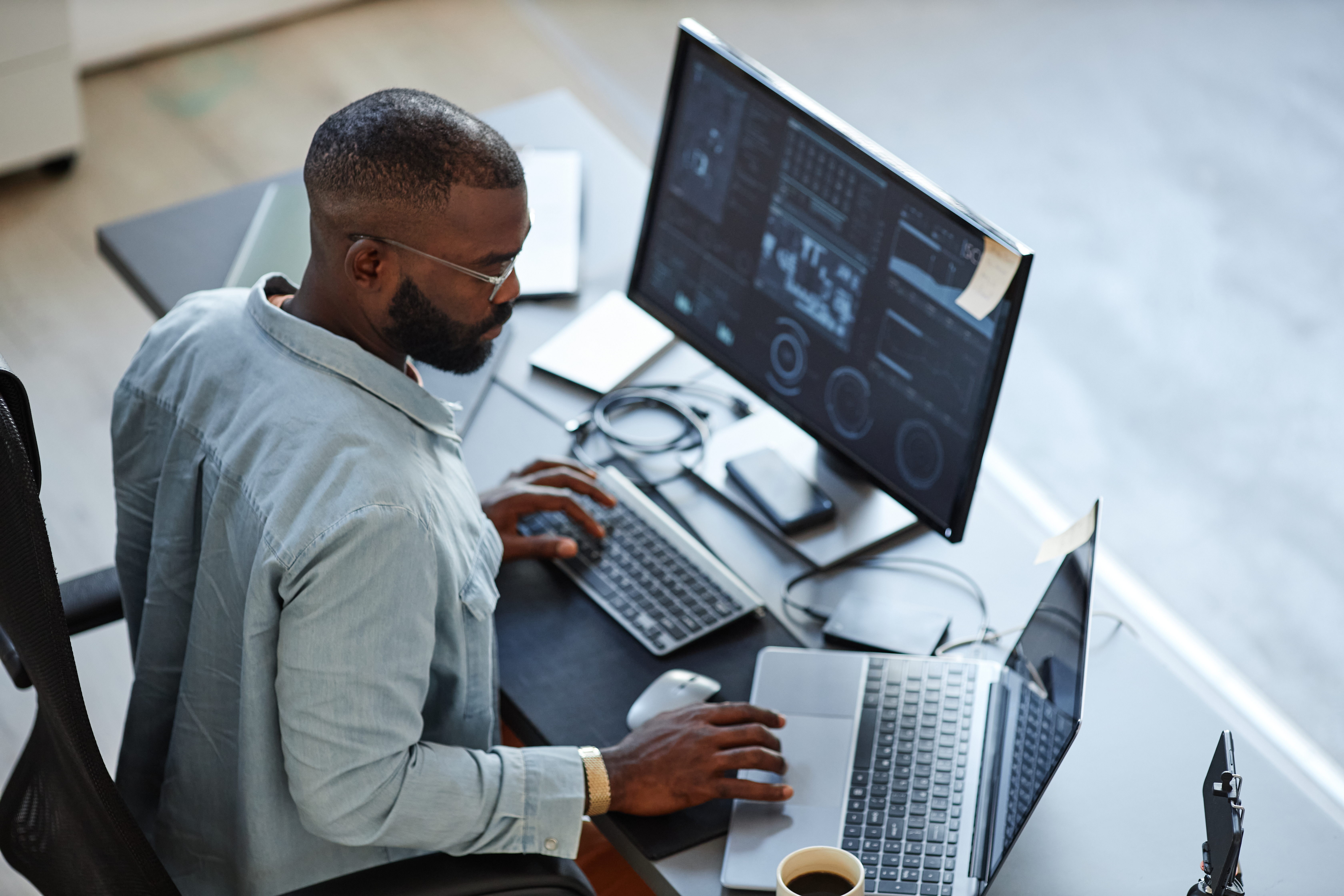 Man working on computer for data 