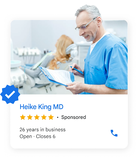 A local ad shows a dentist reviewing a chart near a patient in a chair.